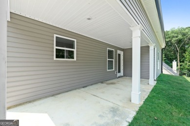 Discover this stunning 3-bedroom, 2.5-bath home with a spacious on Turtle Cove Golf Course in Georgia - for sale on GolfHomes.com, golf home, golf lot