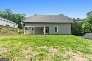 Discover this stunning 3-bedroom, 2.5-bath home with a spacious on Turtle Cove Golf Course in Georgia - for sale on GolfHomes.com, golf home, golf lot