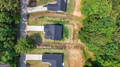 Discover this stunning 3-bedroom, 2.5-bath home with a spacious on Turtle Cove Golf Course in Georgia - for sale on GolfHomes.com, golf home, golf lot