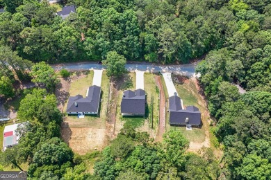 Discover this stunning 3-bedroom, 2.5-bath home with a spacious on Turtle Cove Golf Course in Georgia - for sale on GolfHomes.com, golf home, golf lot