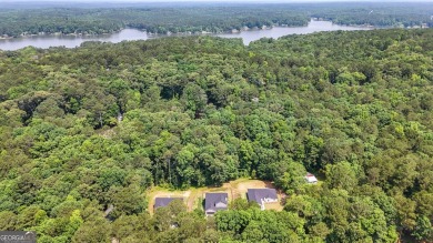 Discover this stunning 3-bedroom, 2.5-bath home with a spacious on Turtle Cove Golf Course in Georgia - for sale on GolfHomes.com, golf home, golf lot