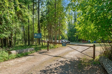 Nestled in the picturesque landscapes of Whitefish, Montana on Iron Horse Golf Club in Montana - for sale on GolfHomes.com, golf home, golf lot