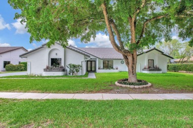 Move right into a FULLY renovated 4 bedroom 3 bath  + office on Boca Woods Country Club in Florida - for sale on GolfHomes.com, golf home, golf lot