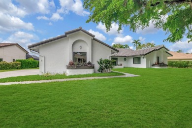 Move right into a FULLY renovated 4 bedroom 3 bath  + office on Boca Woods Country Club in Florida - for sale on GolfHomes.com, golf home, golf lot