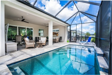 WELCOME HOME! The sought-after New Smyrna Beach community of on Venetian Bay Golf Course in Florida - for sale on GolfHomes.com, golf home, golf lot