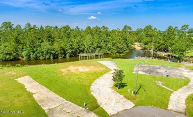 Beautiful waterfront lot with deep water access located just on Diamondhead Country Club in Mississippi - for sale on GolfHomes.com, golf home, golf lot