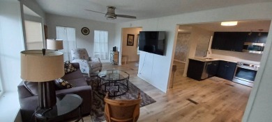 Come settle down and relax in a beautiful, manufactured home on Fairways Country Club in Florida - for sale on GolfHomes.com, golf home, golf lot