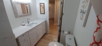 Come settle down and relax in a beautiful, manufactured home on Fairways Country Club in Florida - for sale on GolfHomes.com, golf home, golf lot