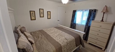Come settle down and relax in a beautiful, manufactured home on Fairways Country Club in Florida - for sale on GolfHomes.com, golf home, golf lot