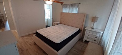 Come settle down and relax in a beautiful, manufactured home on Fairways Country Club in Florida - for sale on GolfHomes.com, golf home, golf lot