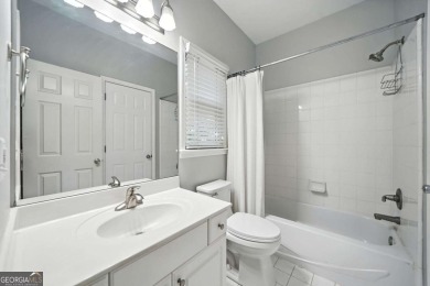 Beautifully situated BridgeMill home less than 1 mile from the on Bridgemill Golf Club in Georgia - for sale on GolfHomes.com, golf home, golf lot