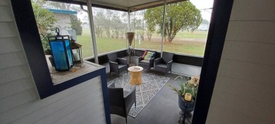 Come settle down and relax in a beautiful, manufactured home on Fairways Country Club in Florida - for sale on GolfHomes.com, golf home, golf lot