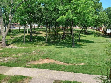 Beautifully remodeled 2-bedroom 2 bath home. Quaint 55 and older on Cedar Glade Golf Course in Arkansas - for sale on GolfHomes.com, golf home, golf lot