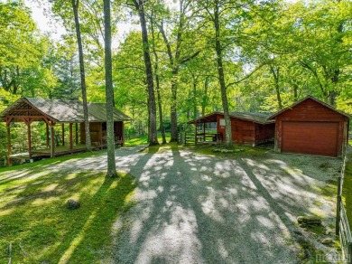 Nestled amidst the serene beauty of the Western North Carolina on High Hampton Inn and Country Club in North Carolina - for sale on GolfHomes.com, golf home, golf lot