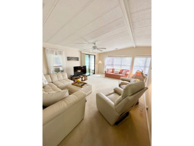 Looking for a cozy winter getaway or a year-round haven? This on Pine Lakes Country Club in Florida - for sale on GolfHomes.com, golf home, golf lot
