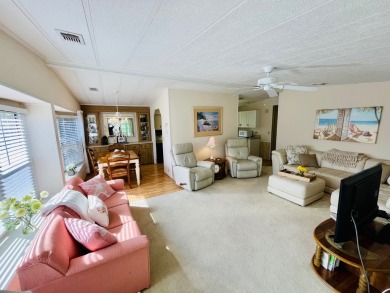 Looking for a cozy winter getaway or a year-round haven? This on Pine Lakes Country Club in Florida - for sale on GolfHomes.com, golf home, golf lot