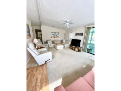 Looking for a cozy winter getaway or a year-round haven? This on Pine Lakes Country Club in Florida - for sale on GolfHomes.com, golf home, golf lot