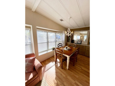 Looking for a cozy winter getaway or a year-round haven? This on Pine Lakes Country Club in Florida - for sale on GolfHomes.com, golf home, golf lot
