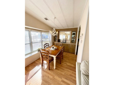 Looking for a cozy winter getaway or a year-round haven? This on Pine Lakes Country Club in Florida - for sale on GolfHomes.com, golf home, golf lot