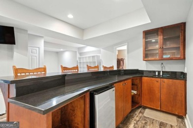 Beautifully situated BridgeMill home less than 1 mile from the on Bridgemill Golf Club in Georgia - for sale on GolfHomes.com, golf home, golf lot