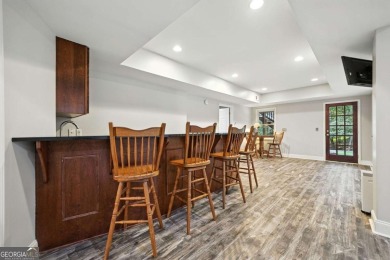 Beautifully situated BridgeMill home less than 1 mile from the on Bridgemill Golf Club in Georgia - for sale on GolfHomes.com, golf home, golf lot