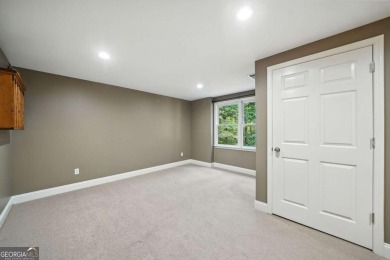 Beautifully situated BridgeMill home less than 1 mile from the on Bridgemill Golf Club in Georgia - for sale on GolfHomes.com, golf home, golf lot