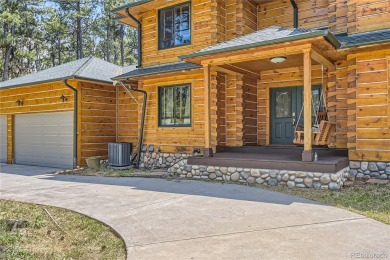 Nestled in the peaceful forest of Larkspur, CO, this mountain on The Golf Club At Bear Dance in Colorado - for sale on GolfHomes.com, golf home, golf lot