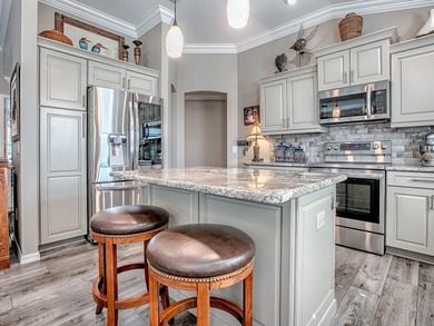 Beautifully Designed & Updated Anna Maria Courtyard Villa in the on Pennbrooke Fairways in Florida - for sale on GolfHomes.com, golf home, golf lot