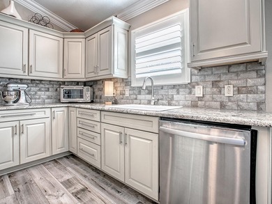 Beautifully Designed & Updated Anna Maria Courtyard Villa in the on Pennbrooke Fairways in Florida - for sale on GolfHomes.com, golf home, golf lot