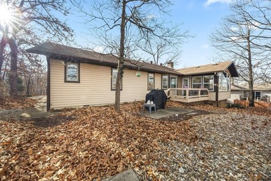 Tucked in Dunvegan near Loch Lomond, this refreshed single-level on Bella Vista Country Club - Scottsdale in Arkansas - for sale on GolfHomes.com, golf home, golf lot
