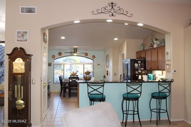 Welcome to this extended Loredo model with larger dining, den & on Quail Creek Country Club  in Arizona - for sale on GolfHomes.com, golf home, golf lot