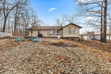 Tucked in Dunvegan near Loch Lomond, this refreshed single-level on Bella Vista Country Club - Scottsdale in Arkansas - for sale on GolfHomes.com, golf home, golf lot