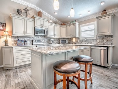 Beautifully Designed & Updated Anna Maria Courtyard Villa in the on Pennbrooke Fairways in Florida - for sale on GolfHomes.com, golf home, golf lot