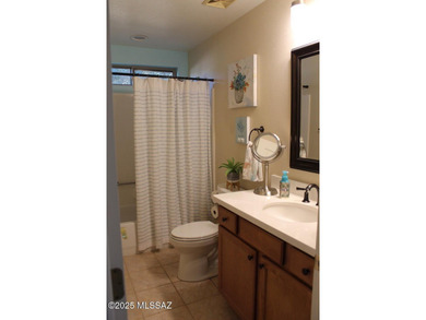 Welcome to this extended Loredo model with larger dining, den & on Quail Creek Country Club  in Arizona - for sale on GolfHomes.com, golf home, golf lot