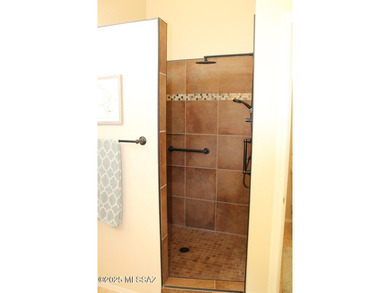 Welcome to this extended Loredo model with larger dining, den & on Quail Creek Country Club  in Arizona - for sale on GolfHomes.com, golf home, golf lot