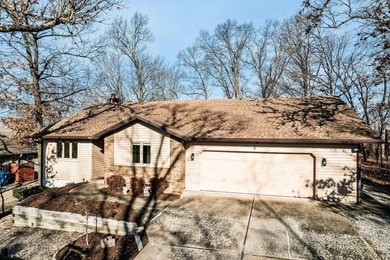 Tucked in Dunvegan near Loch Lomond, this refreshed single-level on Bella Vista Country Club - Scottsdale in Arkansas - for sale on GolfHomes.com, golf home, golf lot