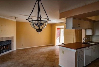 Fall in love with this spacious 2-bedroom, 2-bathroom condo on Stevens Park Golf Course in Texas - for sale on GolfHomes.com, golf home, golf lot