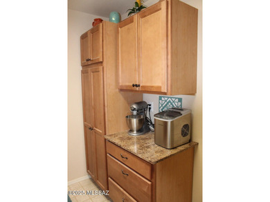 Welcome to this extended Loredo model with larger dining, den & on Quail Creek Country Club  in Arizona - for sale on GolfHomes.com, golf home, golf lot