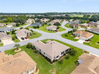 This  Santa Rosa Model has it All! 2 Large Bedrooms Plus a Den! on Eagle Ridge At Spruce Creek Country Club in Florida - for sale on GolfHomes.com, golf home, golf lot