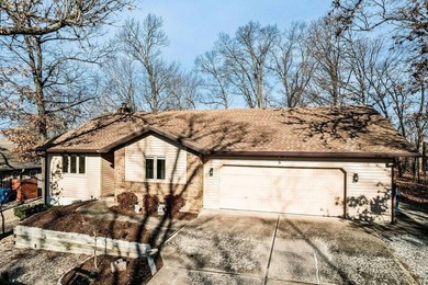 Tucked in Dunvegan near Loch Lomond, this refreshed single-level on Bella Vista Country Club - Scottsdale in Arkansas - for sale on GolfHomes.com, golf home, golf lot