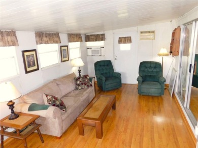 Although this is a charming 2-Bedroom, 1.5-Bath Single Wide in on Betmar Acres Golf Club in Florida - for sale on GolfHomes.com, golf home, golf lot