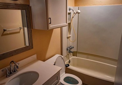 Fall in love with this spacious 2-bedroom, 2-bathroom condo on Stevens Park Golf Course in Texas - for sale on GolfHomes.com, golf home, golf lot