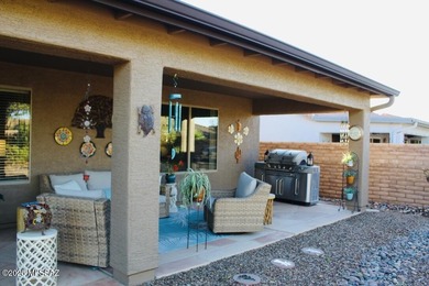 Welcome to this extended Loredo model with larger dining, den & on Quail Creek Country Club  in Arizona - for sale on GolfHomes.com, golf home, golf lot