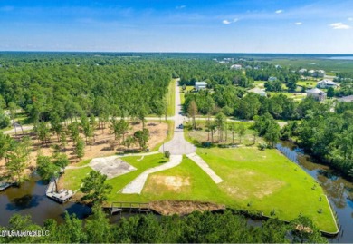 Beautiful waterfront lot with deep water access located on the on Diamondhead Country Club in Mississippi - for sale on GolfHomes.com, golf home, golf lot