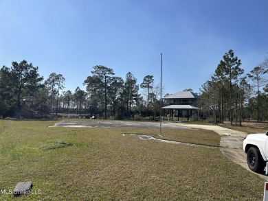 Beautiful waterfront lot with deep water access located on the on Diamondhead Country Club in Mississippi - for sale on GolfHomes.com, golf home, golf lot