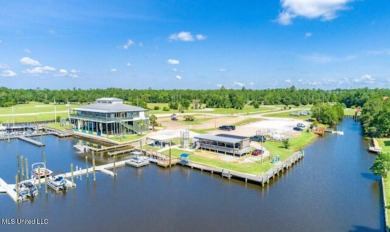 Beautiful waterfront lot with deep water access located on the on Diamondhead Country Club in Mississippi - for sale on GolfHomes.com, golf home, golf lot