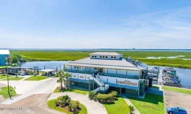 Beautiful waterfront lot with deep water access located on the on Diamondhead Country Club in Mississippi - for sale on GolfHomes.com, golf home, golf lot