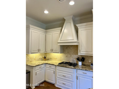 ✨ Overflowing with charm and thoughtful upgrades, this on Lake Caroline Golf Club in Mississippi - for sale on GolfHomes.com, golf home, golf lot