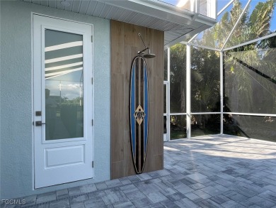 Stunning New Construction Pool Home in Southwest Cape Coral! 3 on Royal Tee Country Club in Florida - for sale on GolfHomes.com, golf home, golf lot