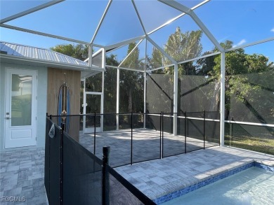 Stunning New Construction Pool Home in Southwest Cape Coral! 3 on Royal Tee Country Club in Florida - for sale on GolfHomes.com, golf home, golf lot